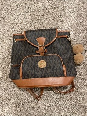 NX Backpack with Pom Pom Charm